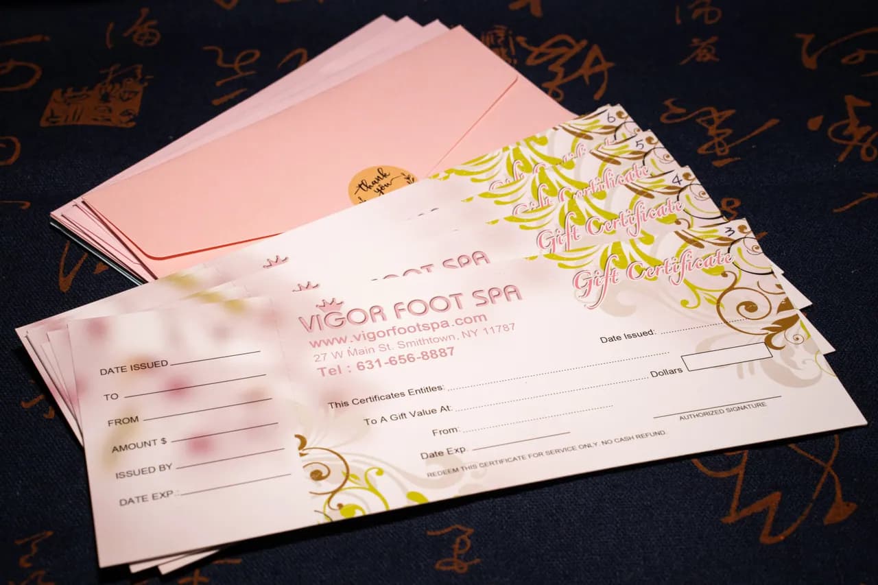 New Vigor Foot Spa gift certificates with pink envelopes